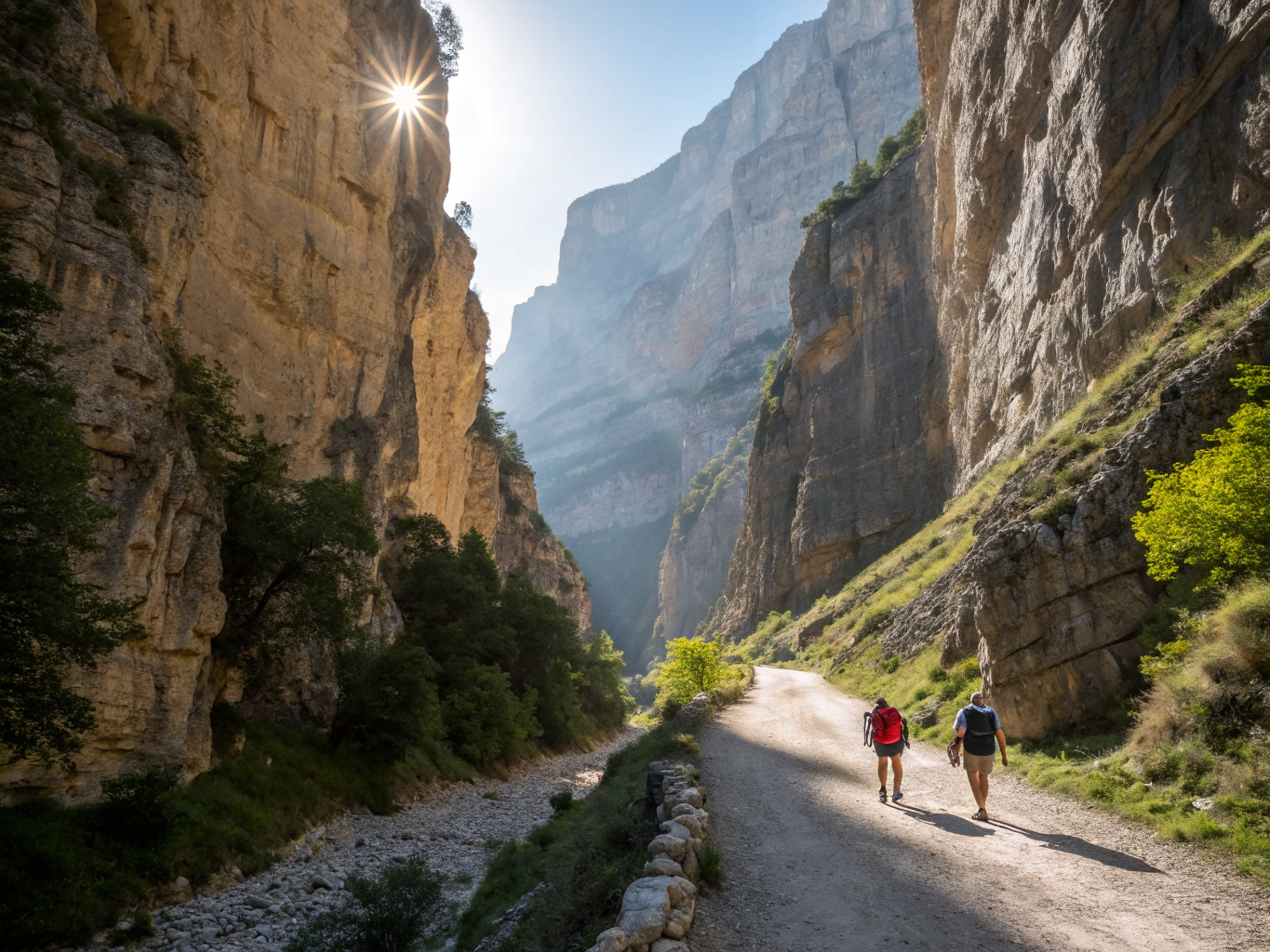 Suspended wooden walkway along sheer canyon cliff in Caminito del Rey