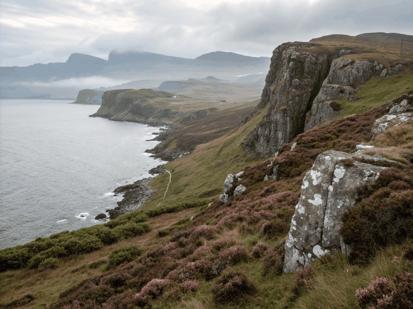 Coastal cliffs and dramatic peaks on the Isle of Skye