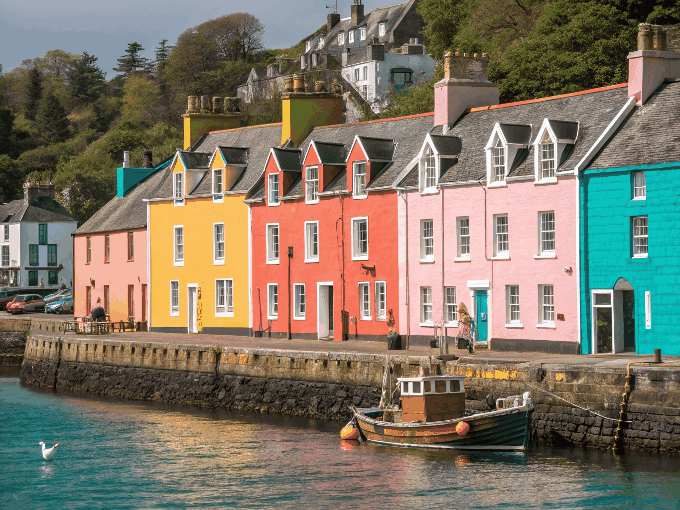 Historic coastal harbour and stone cottages in Fife